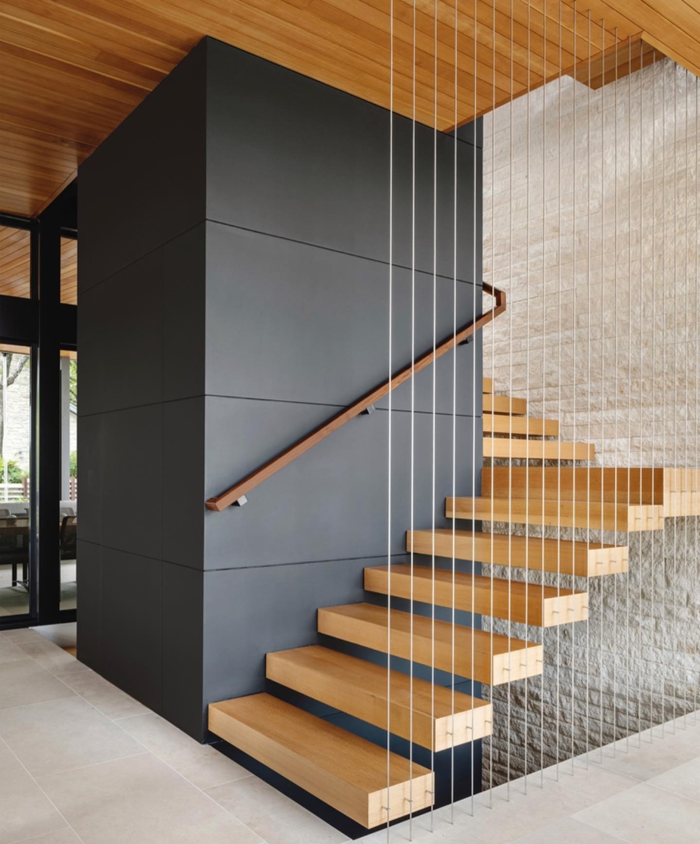 Cantilevered stair treads appear so simple and light. Honestly it takes tons of steel to make it happen.