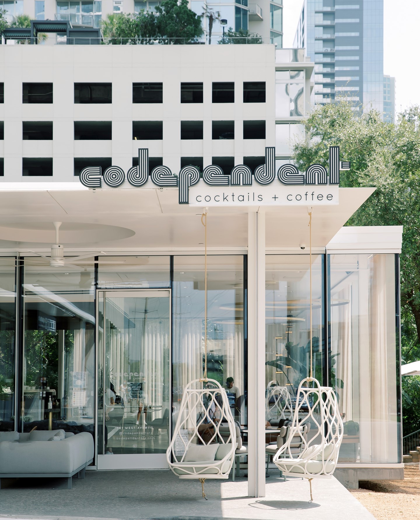 Where else can you sip a cocktail on a swing while overlooking the Austin skyline? ⁠
⁠
Head over to @codependant and experience this unique space by @michaelwesandco